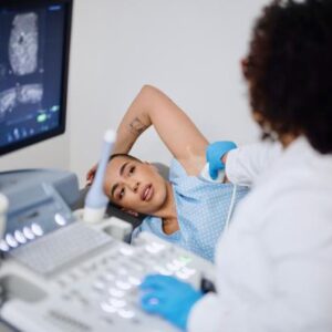 Radiologist ultrasounding the axilla